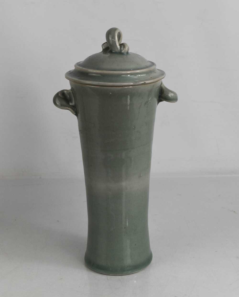 Lot 178 - A Celadon style jar and cover, with twin...