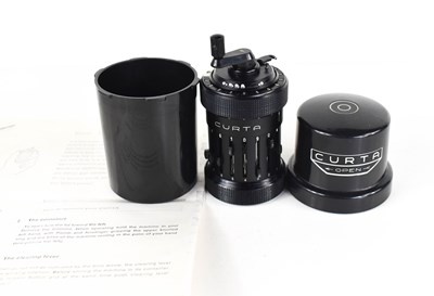 Lot 5 - A vintage Curta calculator, Contina...