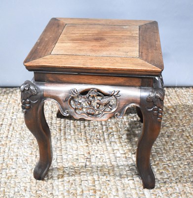 Lot 376 - A Chinese hardwood jardiniere stand, the side...