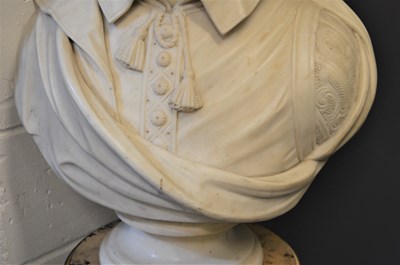 Lot 124 - A carved marble bust of William Shakespeare...
