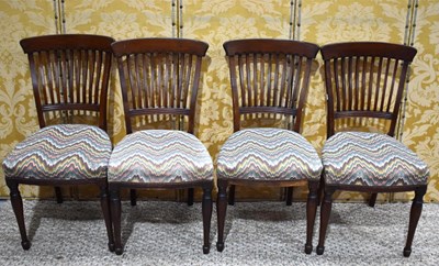 Lot 396 - A set of four Edwardian mahogany dining chairs,...