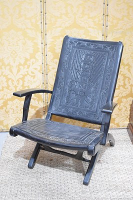 Lot 398 - An early 20th century ebonised Chinese folding...