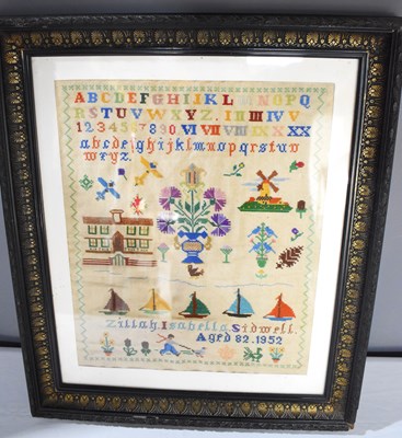 Lot 315 - A mid 20th century needlework sampler by...