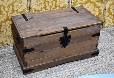 Lot 373 - A metal clad wooden chest with twin handles,...