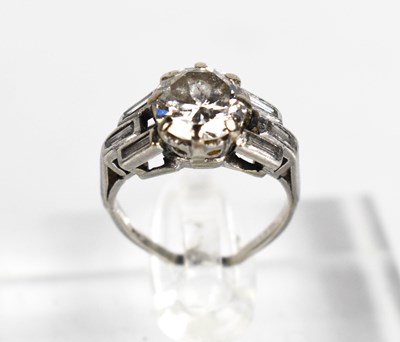 Lot 32 - An Art Deco platinum and diamond ring,...
