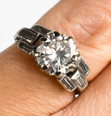 Lot 32 - An Art Deco platinum and diamond ring,...