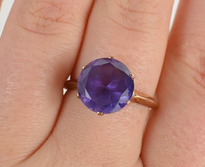 Lot 6 - A 9ct gold and amethyst ring, with six claw...