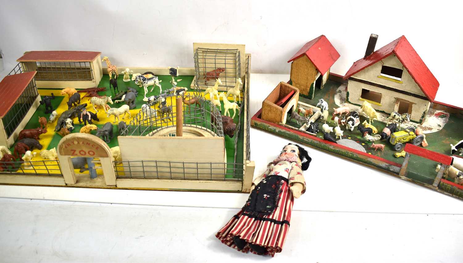 Lot 23 - An Elf Production wooden farm and Zoo set to...