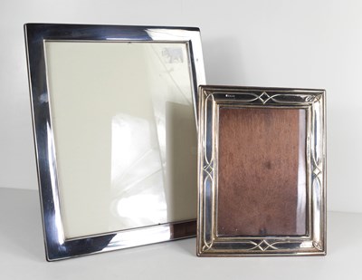 Lot 115 - Two silver table photograph frames, one by...