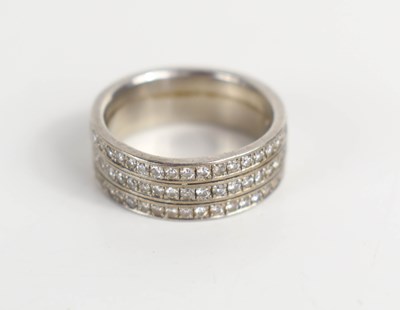 Lot 116 - A platinum and diamond three row full eternity...