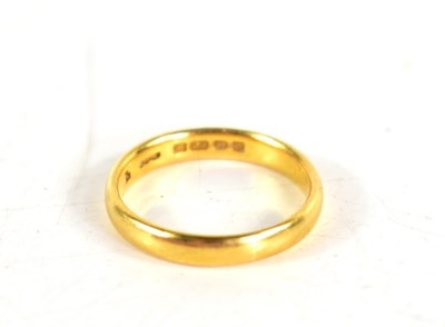 Lot 131 - A 22ct gold wedding band, size M, 3.8g.