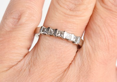 Lot 141 - An 18ct white gold and diamond ring, set with...