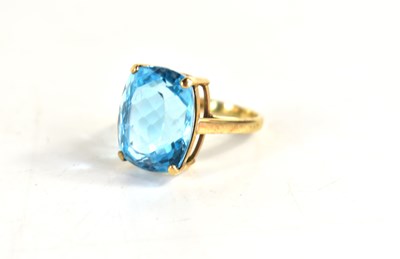 Lot 148 - A 9ct gold and blue topaz ring, the large...