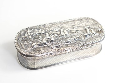 Lot 386 - A Georgian silver snuff box, of elongated oval...