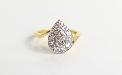 Lot 26 - An 18ct gold and diamond cluster ring, of pear...