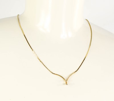 Lot 168 - A 9ct gold and diamond necklace, the box link...