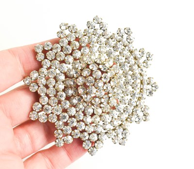 Lot 169 - A vintage diamante starburst dress clip, circa...