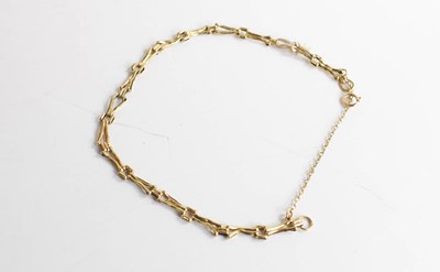 Lot 179 - A 9ct gold fancy link bracelet, with hoop...