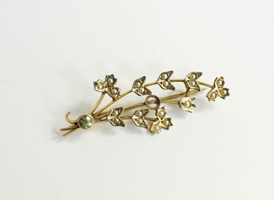 Lot 184 - A 9ct gold, peridot and seed pearl brooch, in...