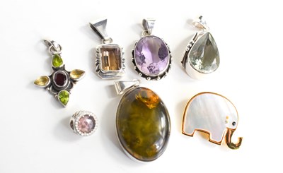 Lot 187 - A group of silver gem set pendants, to include...