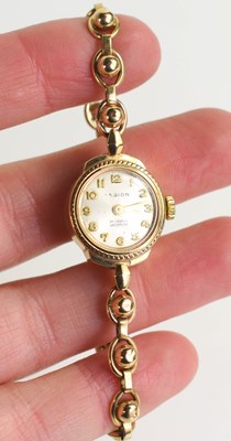 Lot 197 - A 9ct gold Legion ladies cocktail wristwatch,...