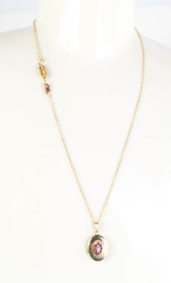 Lot 198 - A 9ct gold chain link necklace with oval...