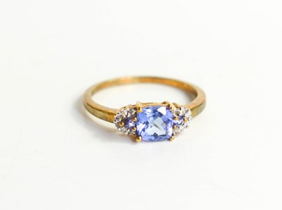 Lot 214 - A 9ct gold and tanzanite ring, size R½, 2.47g.