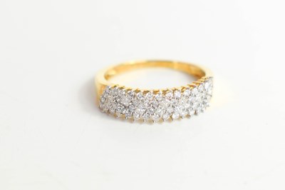 Lot 127 - An 18ct yellow gold, and diamond cluster ring,...