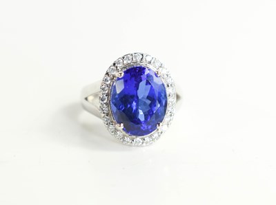 Lot 29 - An 18ct gold, tanzanite and diamond ring,...