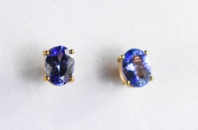 Lot 226 - A pair of 9ct gold and tanzanite stud earrings,...