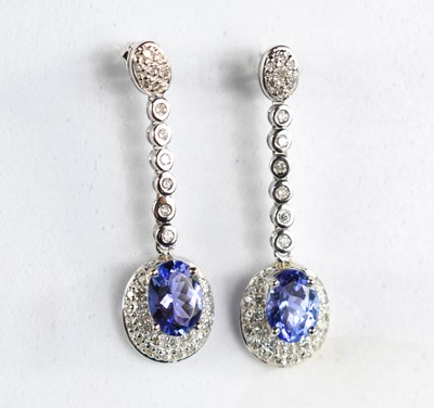 Lot 229 - A pair of 9ct white gold, tanzanite and...