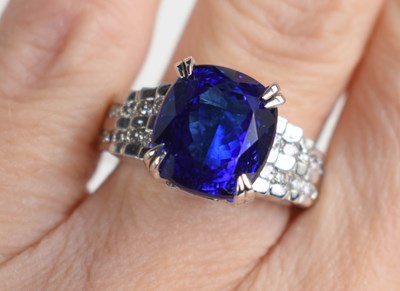 Lot 230 - A 14ct gold blue gemstone and diamonds set...