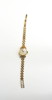 Lot 237 - A 9ct gold ladies wristwatch with Arabic dial,...