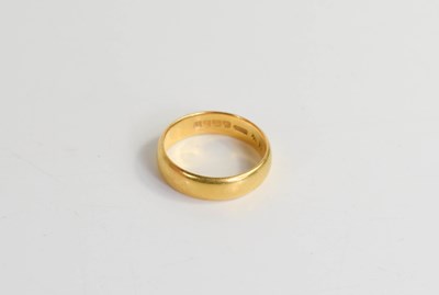 Lot 253 - A 22ct gold wedding band, size N, 5.7g.