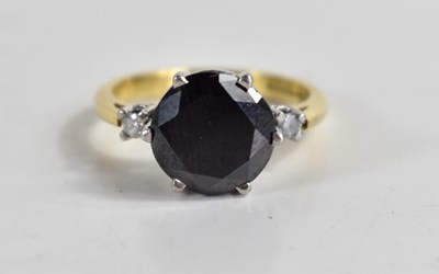 Lot 268 - An 18ct gold ring set with a brilliant cut...