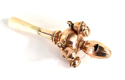 Lot 270 - A 9ct gold baby's rattle with whistle, mother...