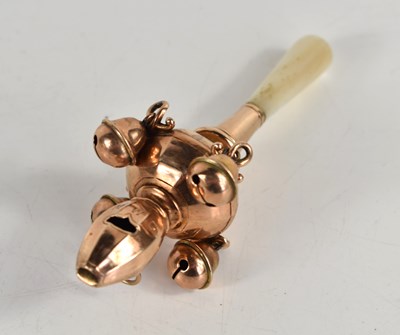 Lot 270 - A 9ct gold baby's rattle with whistle, mother...