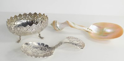 Lot 379 - A silver caddy spoon, pierced and engraved...