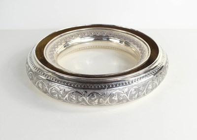 Lot 381 - A white metal Chinese circular flower table...