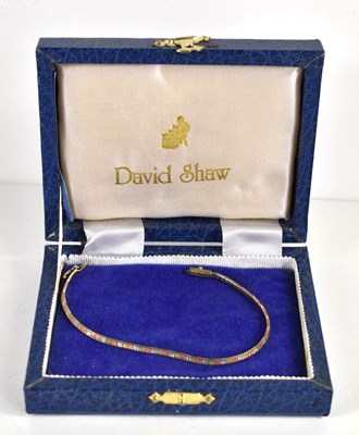 Lot 276 - A 9ct gold box link bracelet, in yellow, rose...