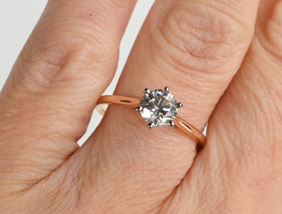 Lot 264 - An 18ct white and rose gold and diamond...