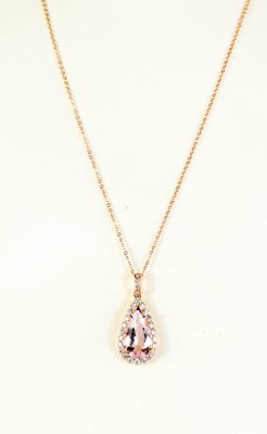 Lot 290 - An 18ct rose gold pear shaped morganite and...