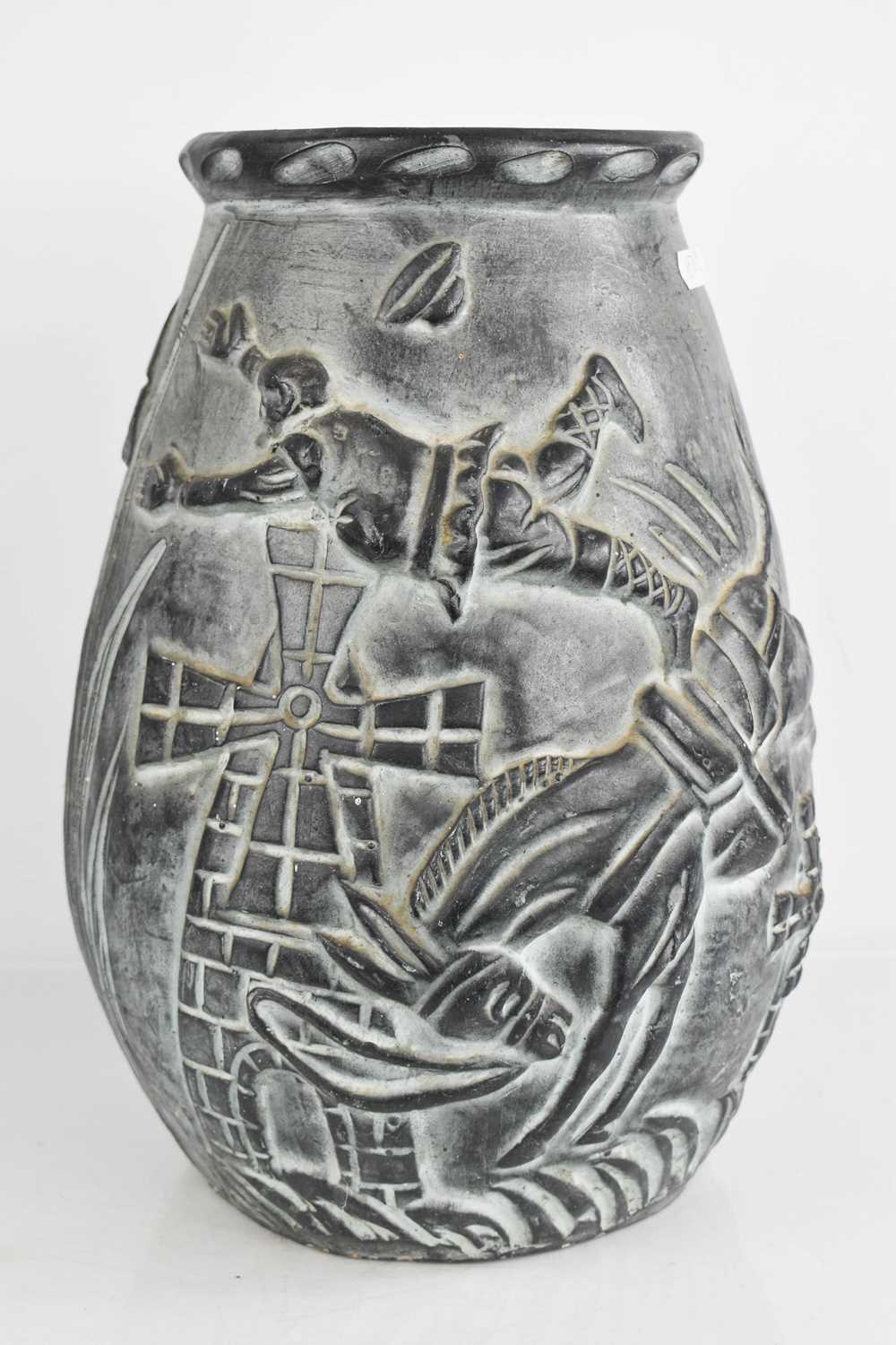 Lot 205 - A large pottery vase, depicting donkey bucking...