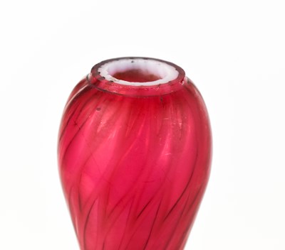 Lot 249 - A late 19th century pink quilted satin vase by...