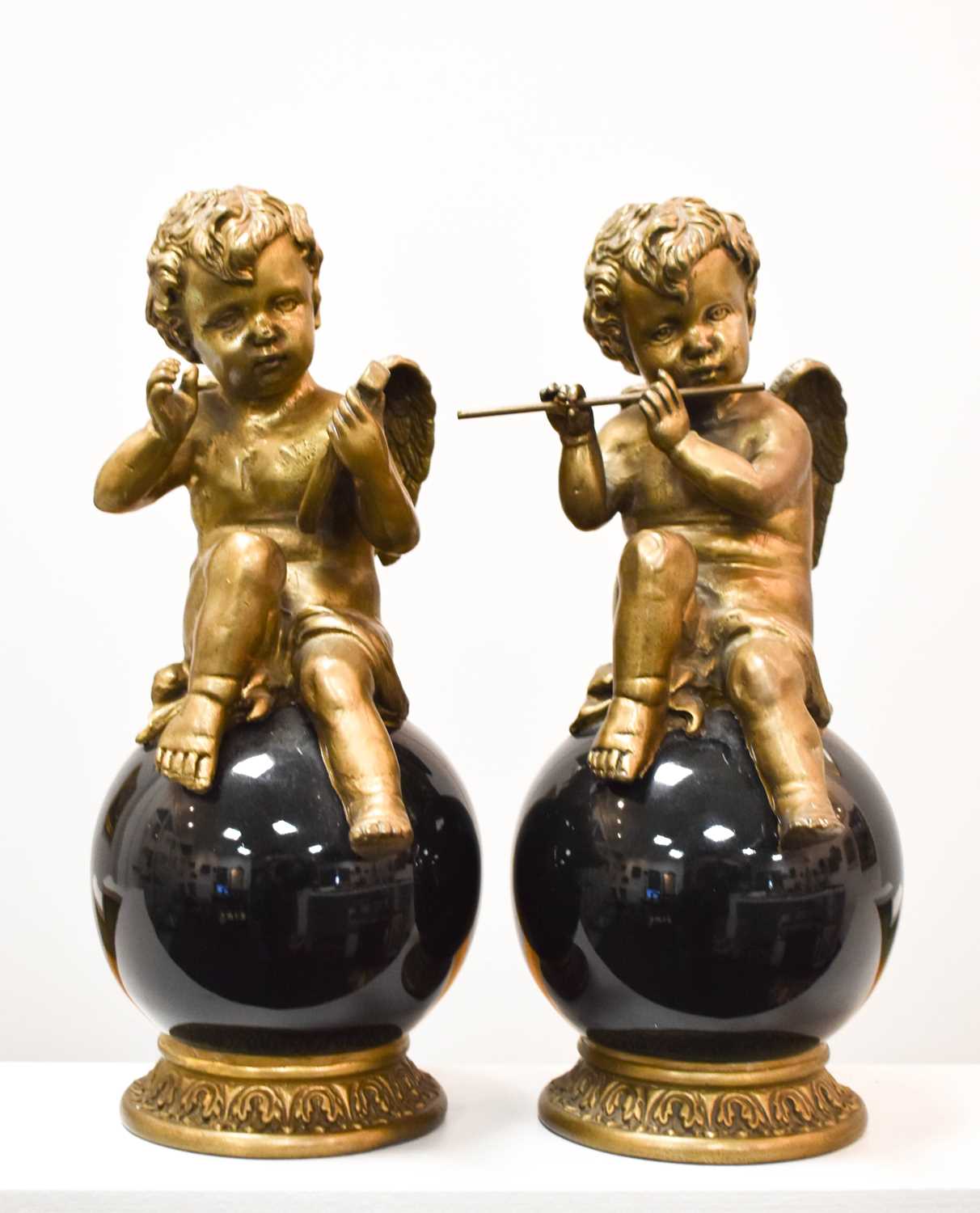 Lot 281 - A pair of William Lowe (1874 - 1930) bronzed...