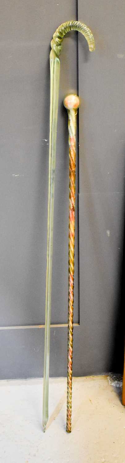 Lot 222 - Two antique glass walking canes, one of spiral...