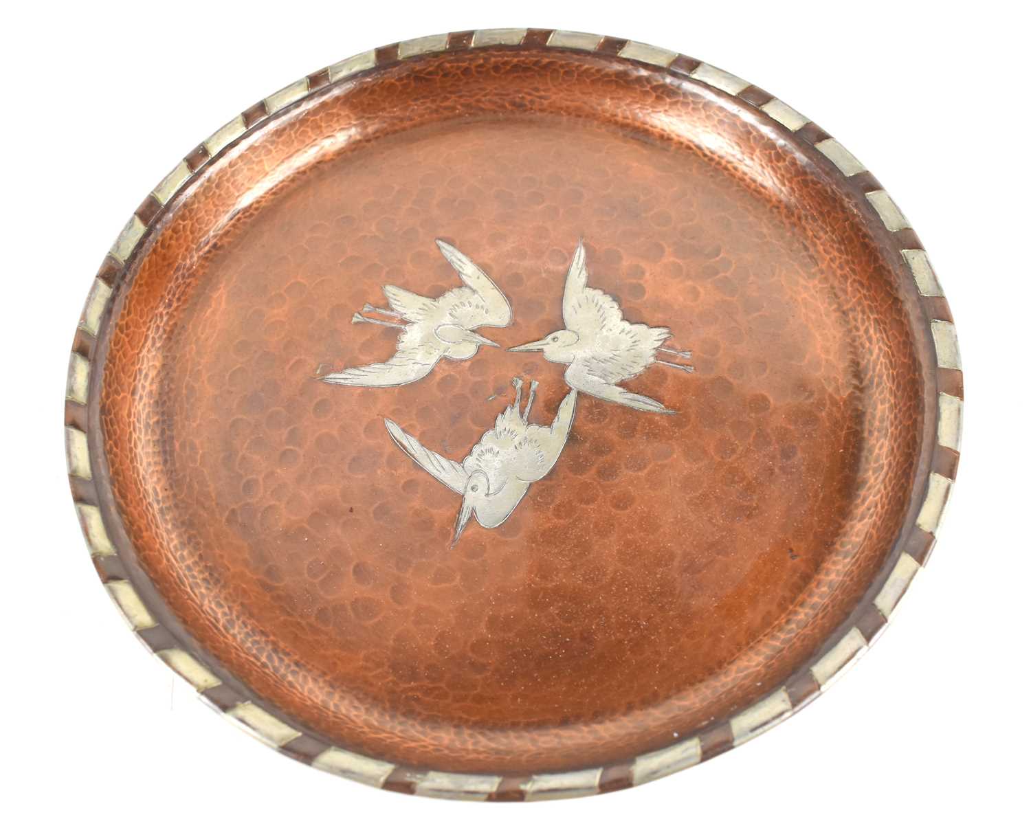 Lot 390 - A Harold Homes Arts & Crafts style copper...
