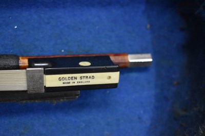 Lot 534 - A Skylark Brand violin with a Golden Strad bow...
