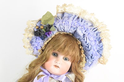 Lot 127 - An antique Kammer & Reinhardt bisque head doll...