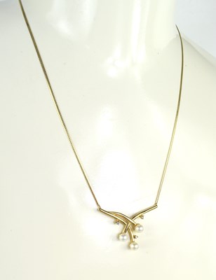 Lot 22 - A 9ct gold, pearl and diamond set pendant...